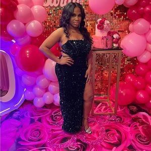 Green sequin gown with slit on side